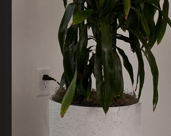 zoomed in image showing to outlet and plug for privacy booth