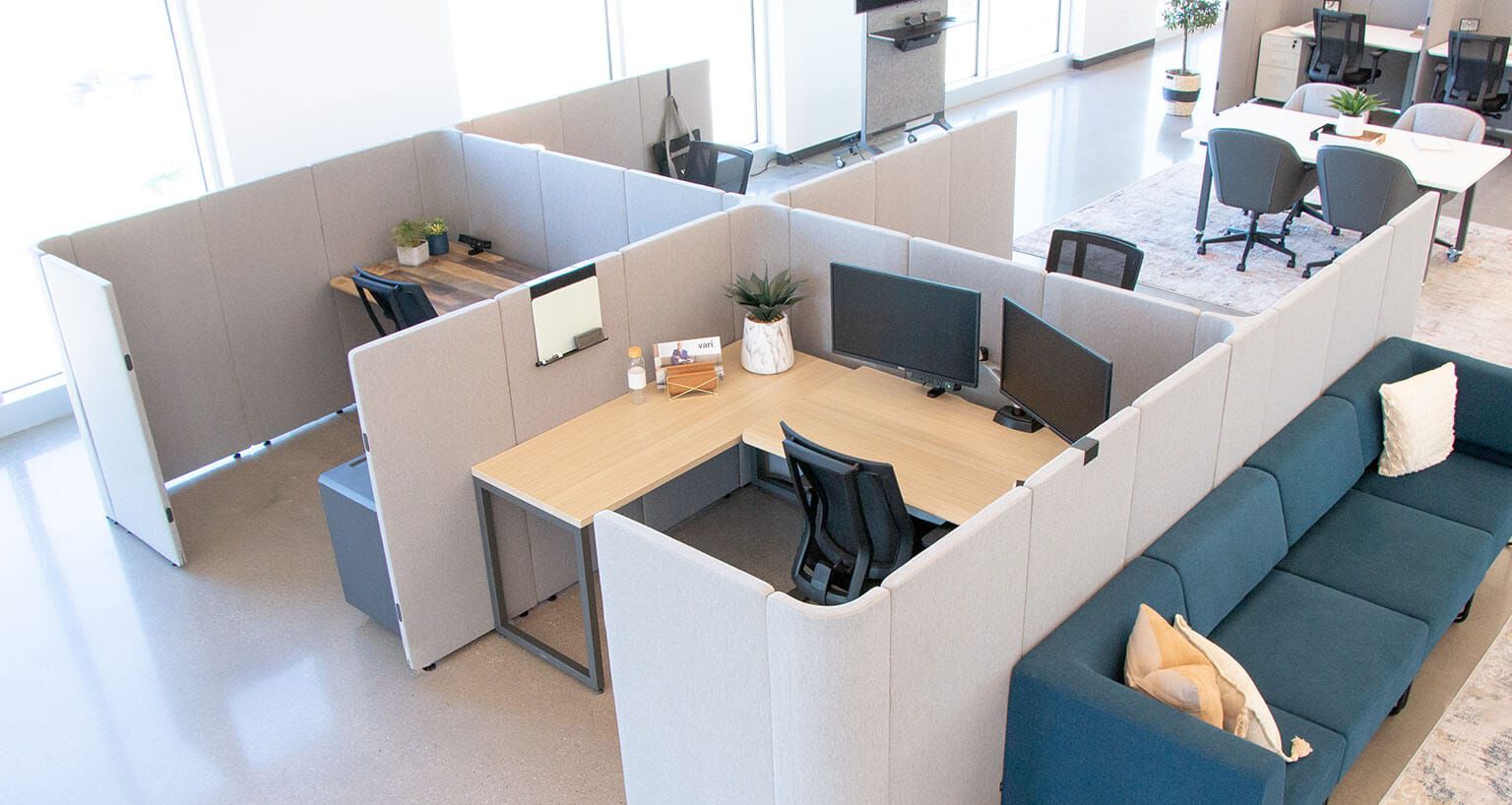 overhead view of cubicle workspaces in an office