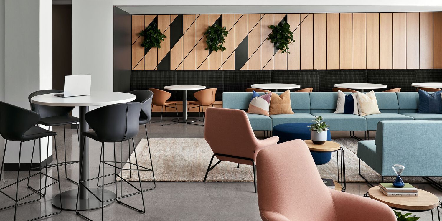 lobby sitting area with chairs, couches and tables