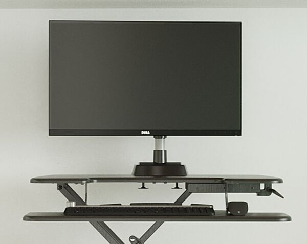 Front view of The Essential Vertical Lift 30, with a monitor and keyboard on top.