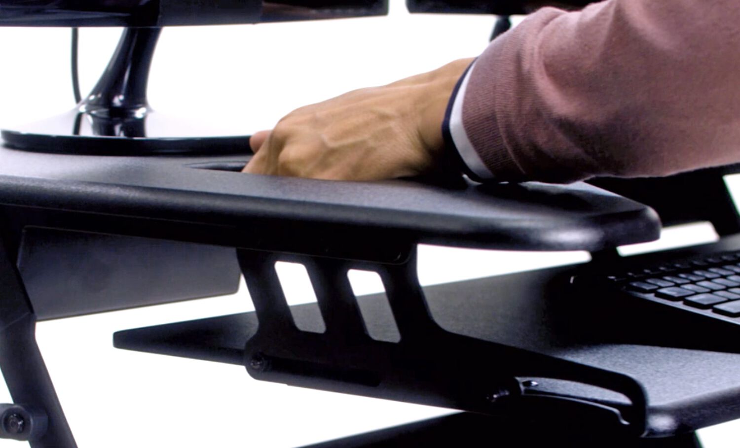 Close up of VariDesk Cube Plus 40 handles in use