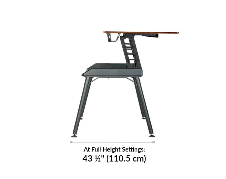 At full height setting, the top of the desk comes towards the user, and takes up a total of 43 and a half inches in depth from front of desk to back of base.