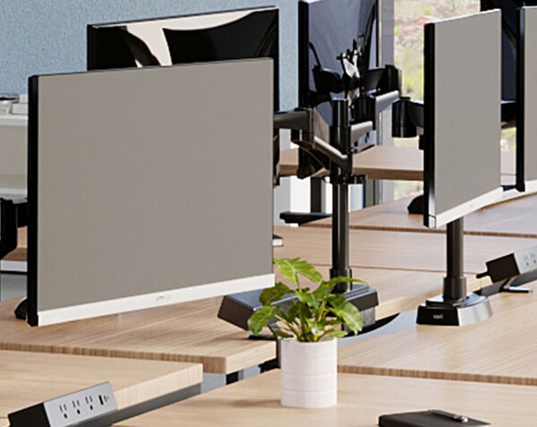 vari light wood tables setup together with monitor arms