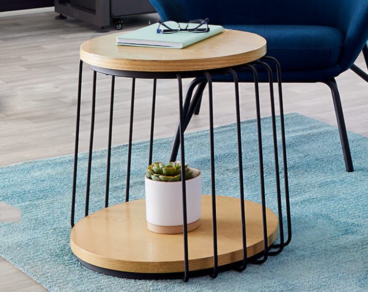 side coffee table with decor and a notebook