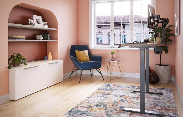 Home office with an ergo electric standing desk 54x26