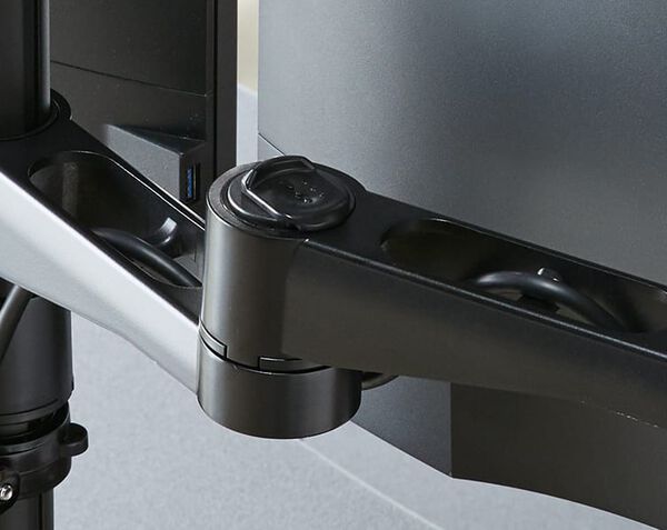 joint of arm seen up close, with easy release feature shown