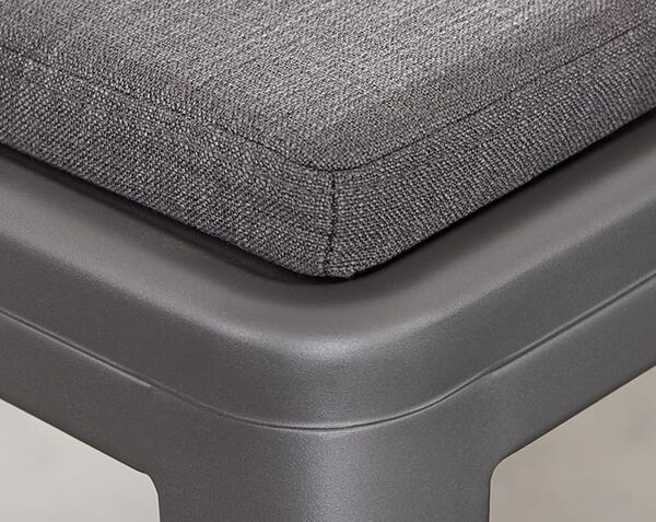 texture of powder-coated steel frame shown up close, as well as sturdy stitching on cushion
