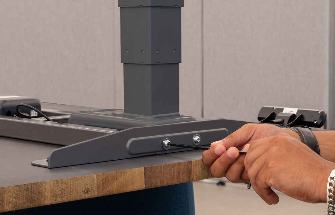 sit to stand desk with 3 tiers of heights, between 25" and 50.5"