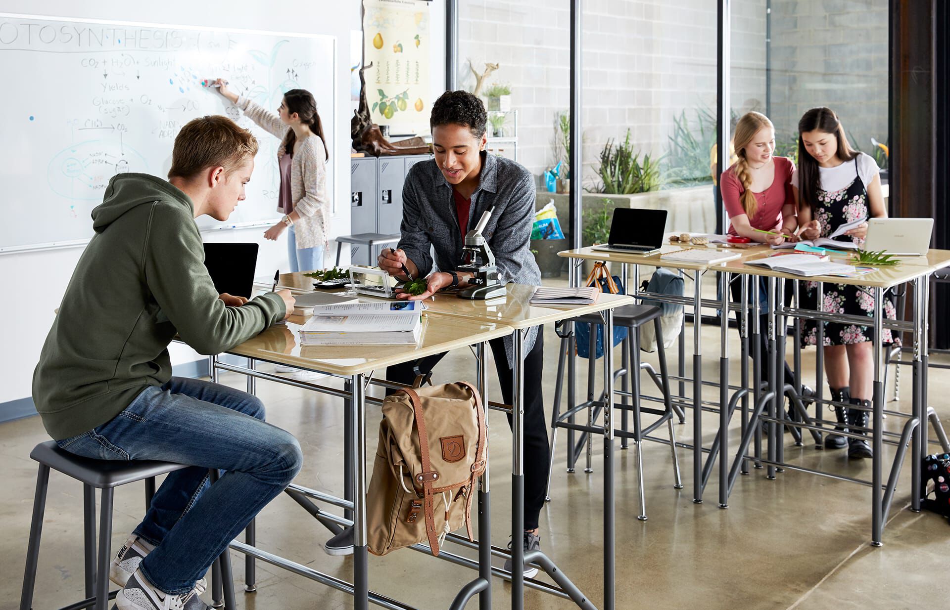 individuals using vari standing school desk for two 5 through 12