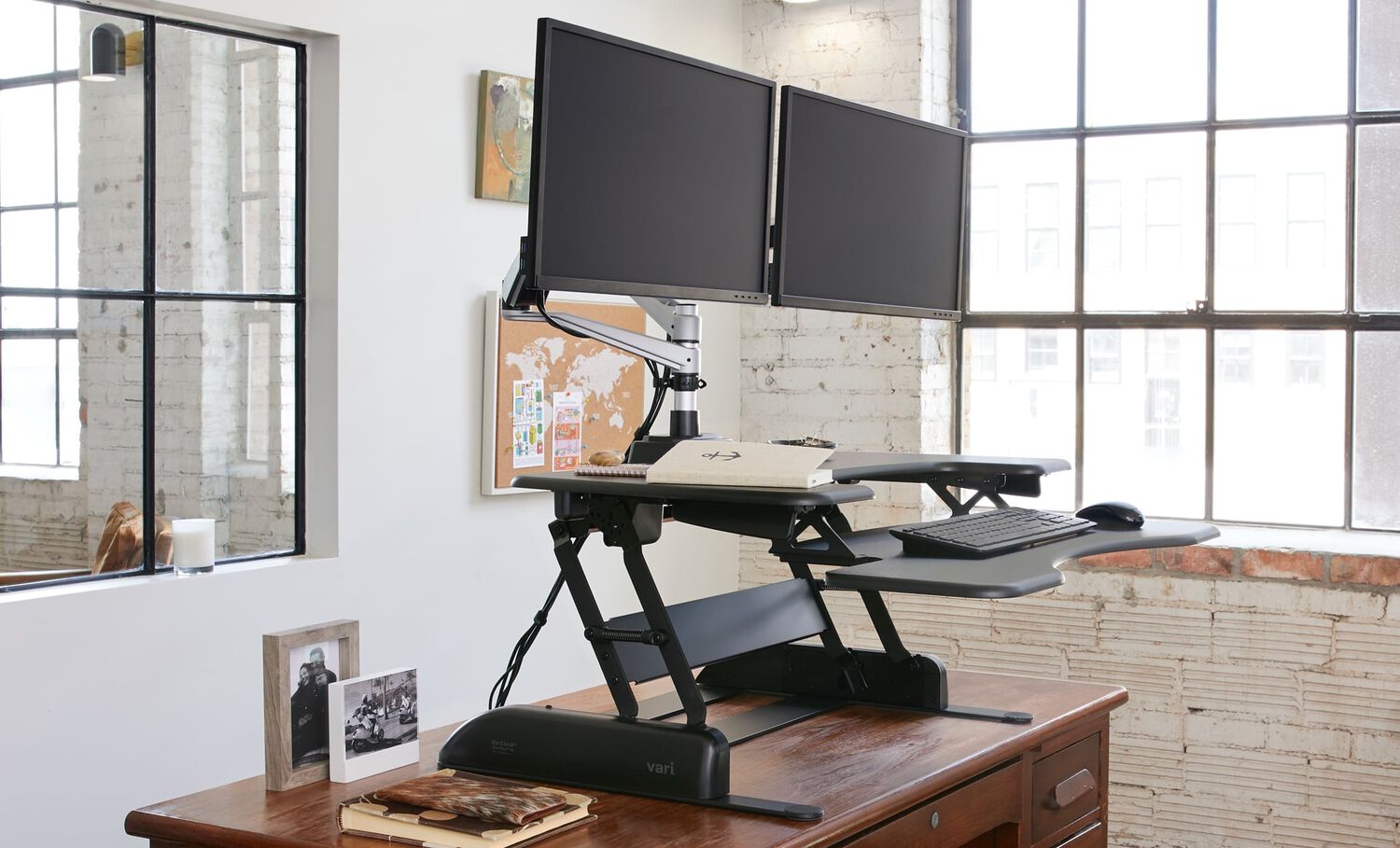desktop converter on existing desk, raised to standing height with two monitors