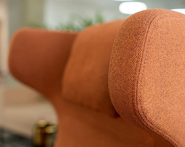 Close up view of high back lounge chair head rest