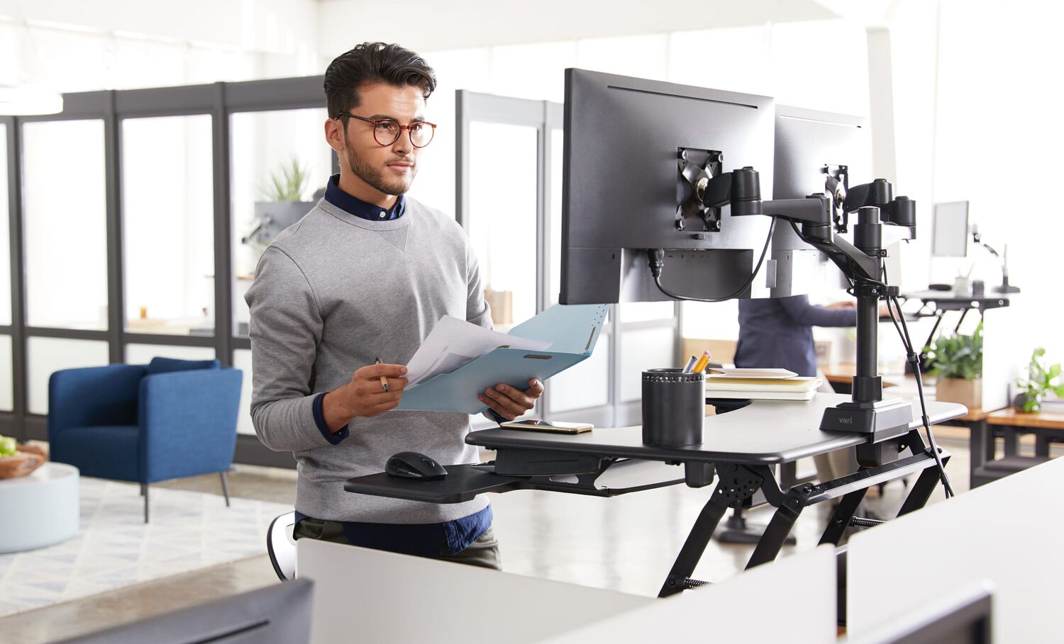varidesk standing desk converter in use