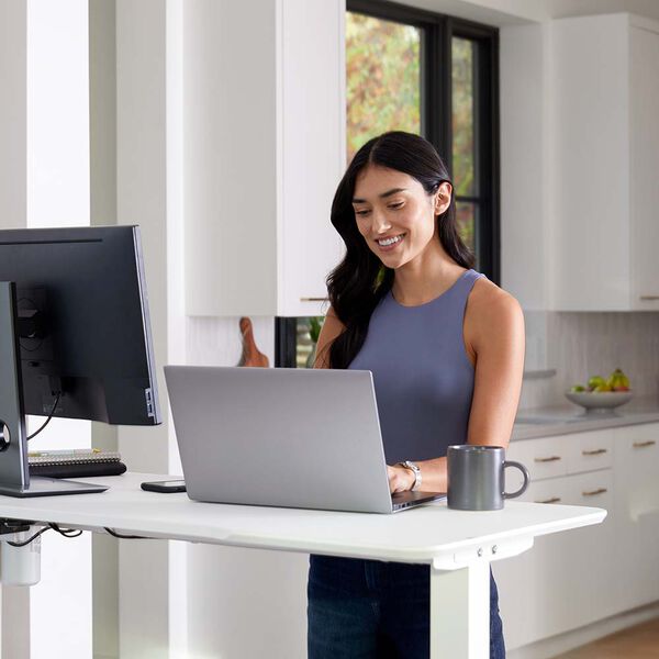professional standing to work at essential standing desk at home