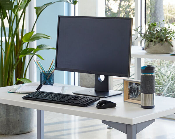 QuickPro™ Table 48 with monitor, keyboard, and mouse to create sleek workstation