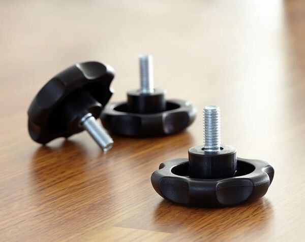 closeup of handbolts, large enough to easily screw in without tools