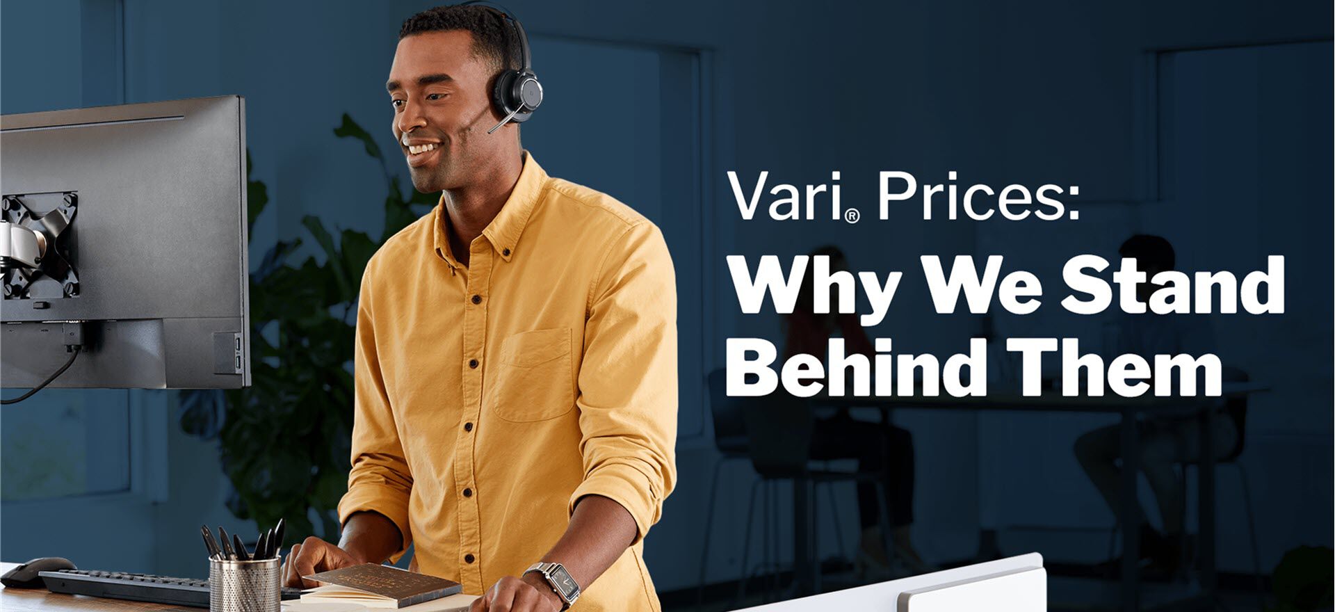 professional working at vari table with headset with the following text - vari prices why we stand behind them