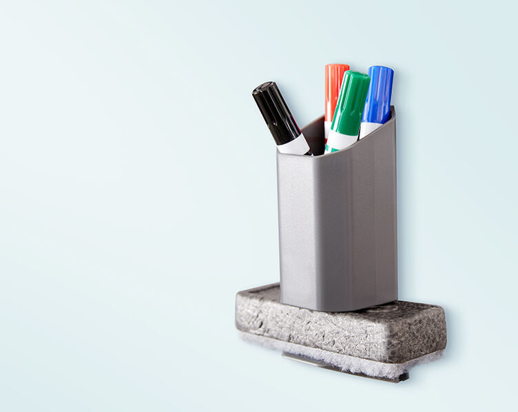 marker cup and eraser holder on glass board