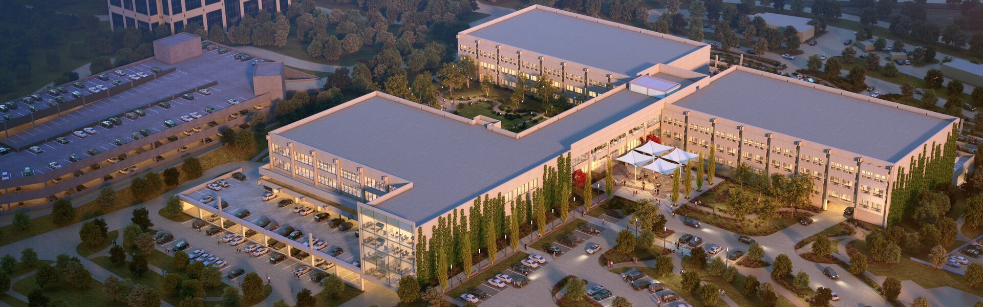 exterior of the Las Colinas location as seen from above, with lush outdoor spaces and a modern feel