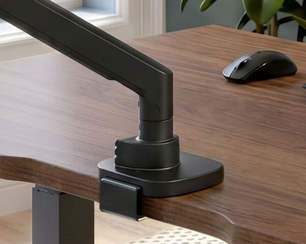 monitor attachment hardware seen from back, with the four hand tightened screws