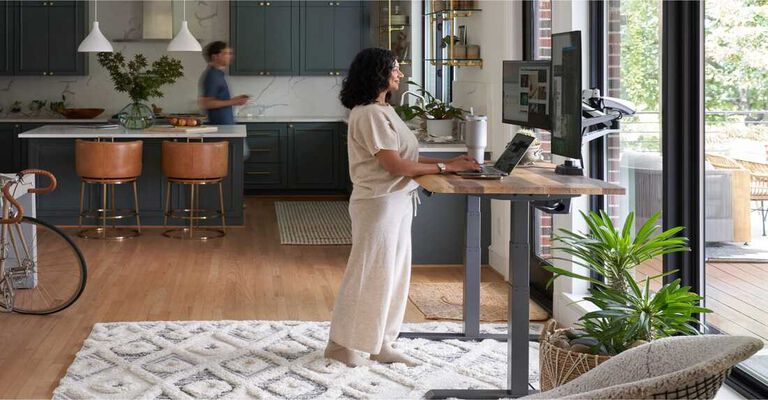 Side views of variety of standing desk solutions