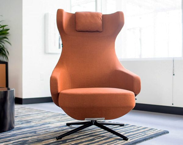 burnt orange high back lounge chair in office setting