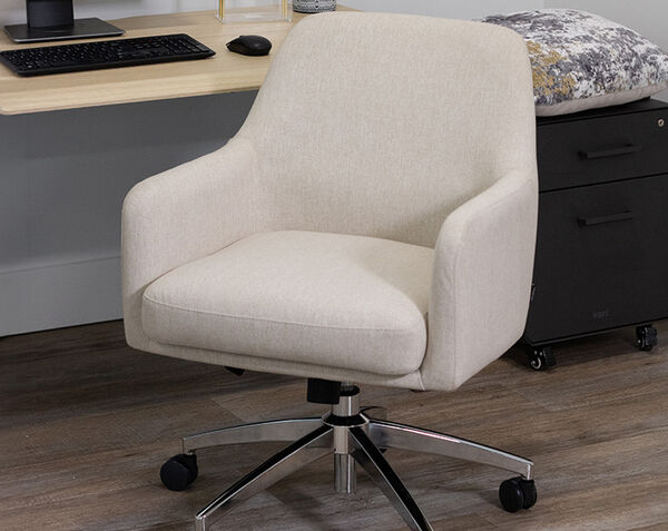 vari tempur pedic upholstered chair in front of an electric standing desk