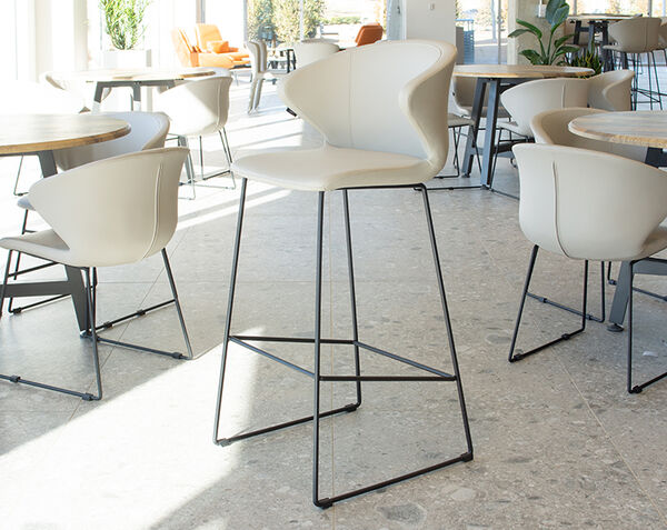 full view of tall cafe chair in lounge setting