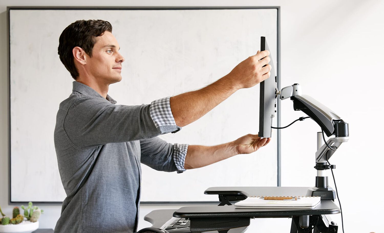 individual adjusting monitor on vari single monitor arm