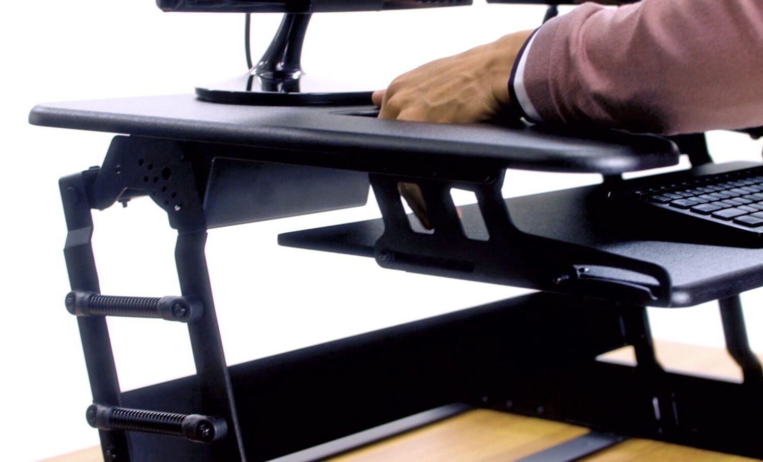 Close up of VariDesk Cube Plus 40 handles in use