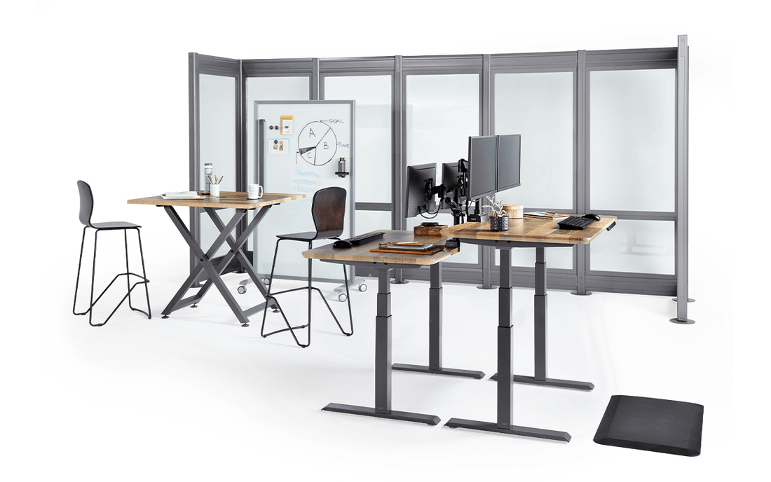 full office project with flexible workspace solutions including standing desks, meeting table, chairs, markerboard, and QuickFlex walls