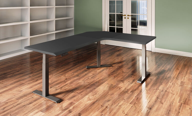 L-Shape Electric Standing Desk setup in an open workspace