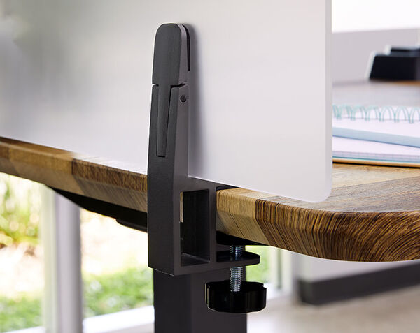 closeup of hardware attaching the desk to the panel