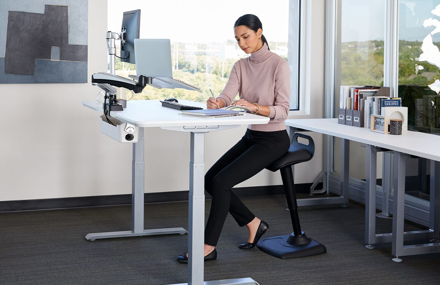 professional working while seating on active seat in office of vari products