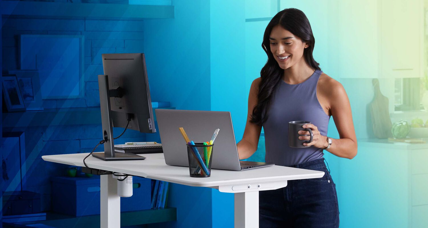 professional working on essential electric standing desk
