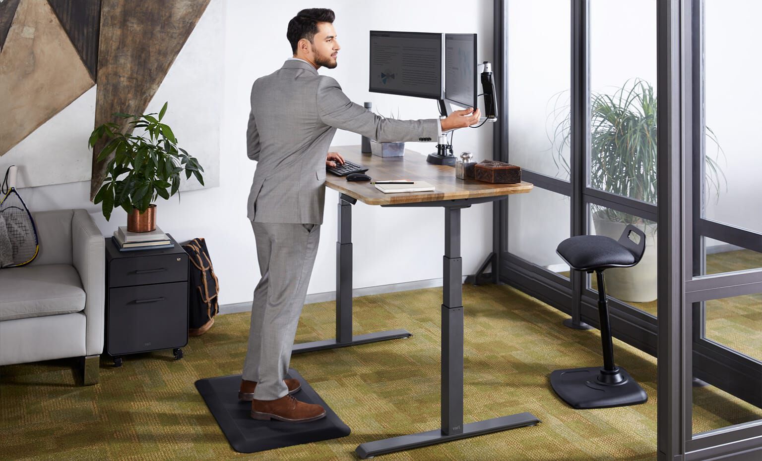 professional works from electric full desk and adjust monitor arms
