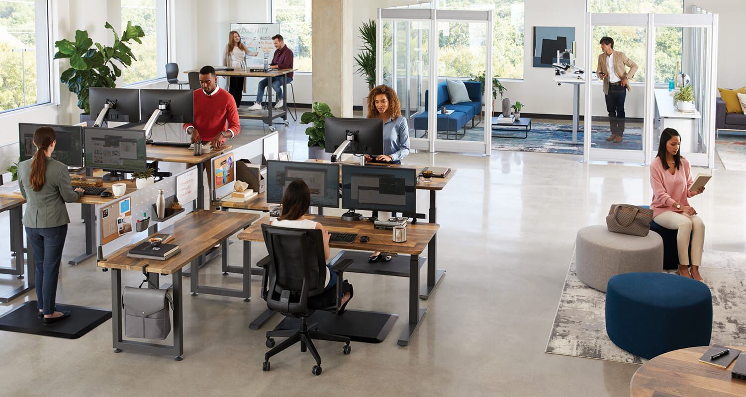 vari office furniture being used by a team in a commercial office workplace