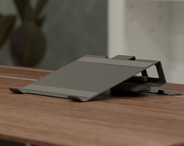 vari tech track laptop stand installed in a electric standing desk