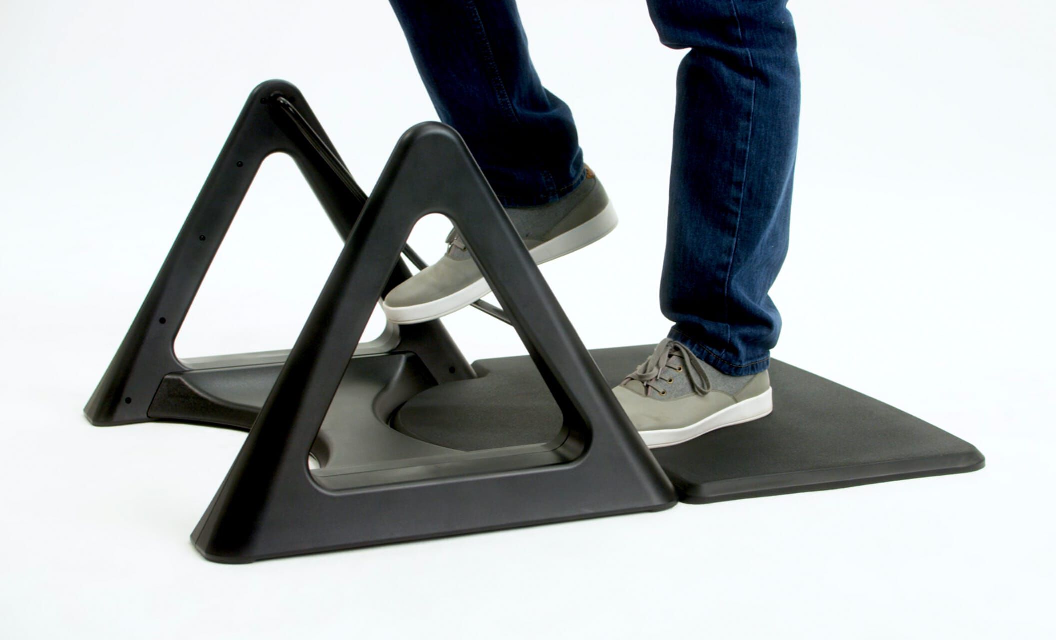 individual using vari active mat rocker
