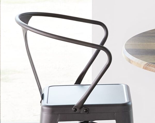 chair seen from side with optional back attached but without cushion for clean look