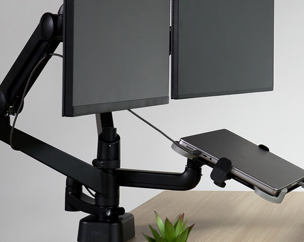 mounting hardware seen in isolation with desk clamping screws fully visible
