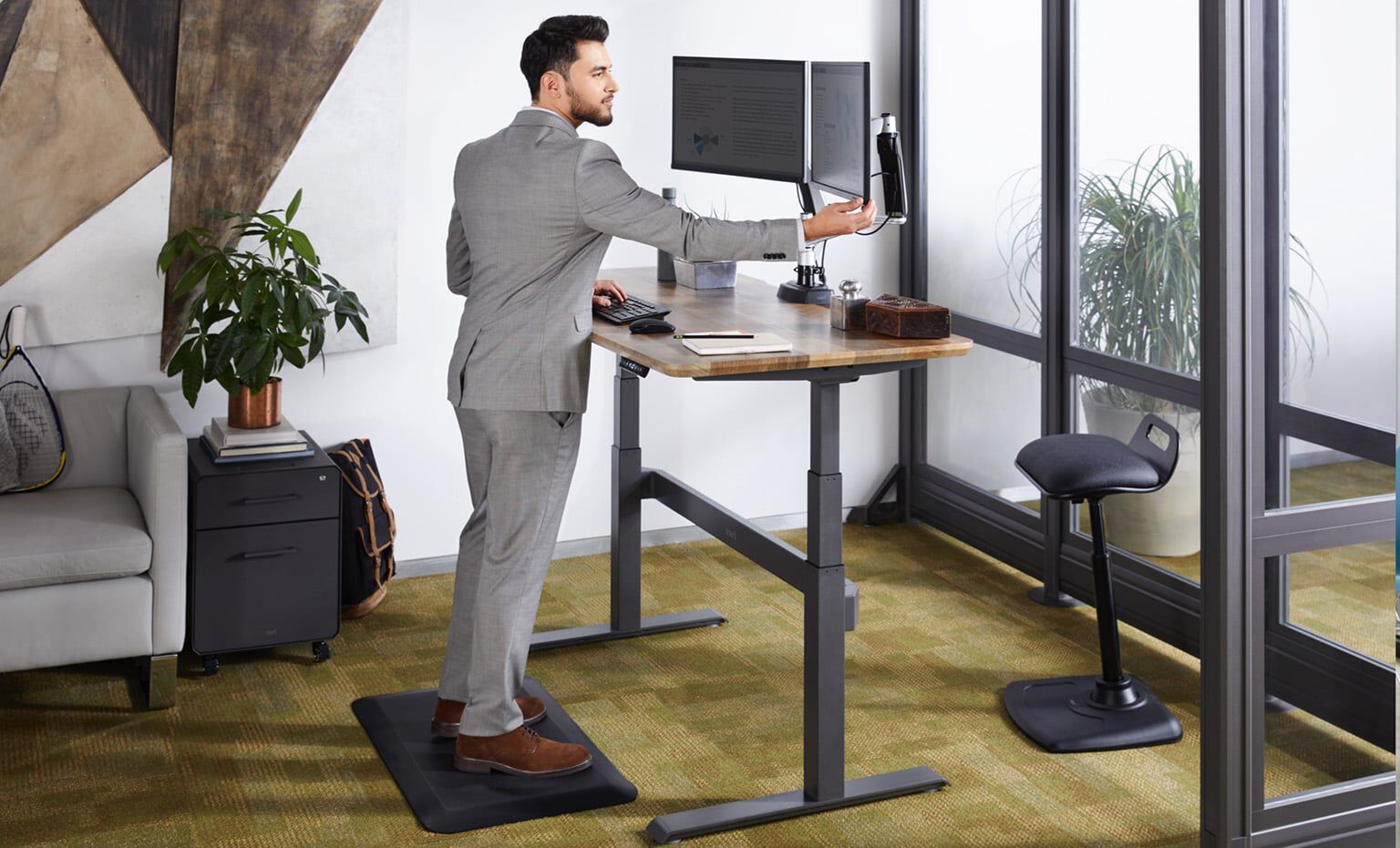 professional works from electric full desk and adjust monitor arms