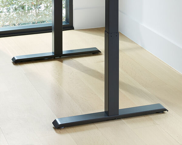 closeup view of electric standing desk feet