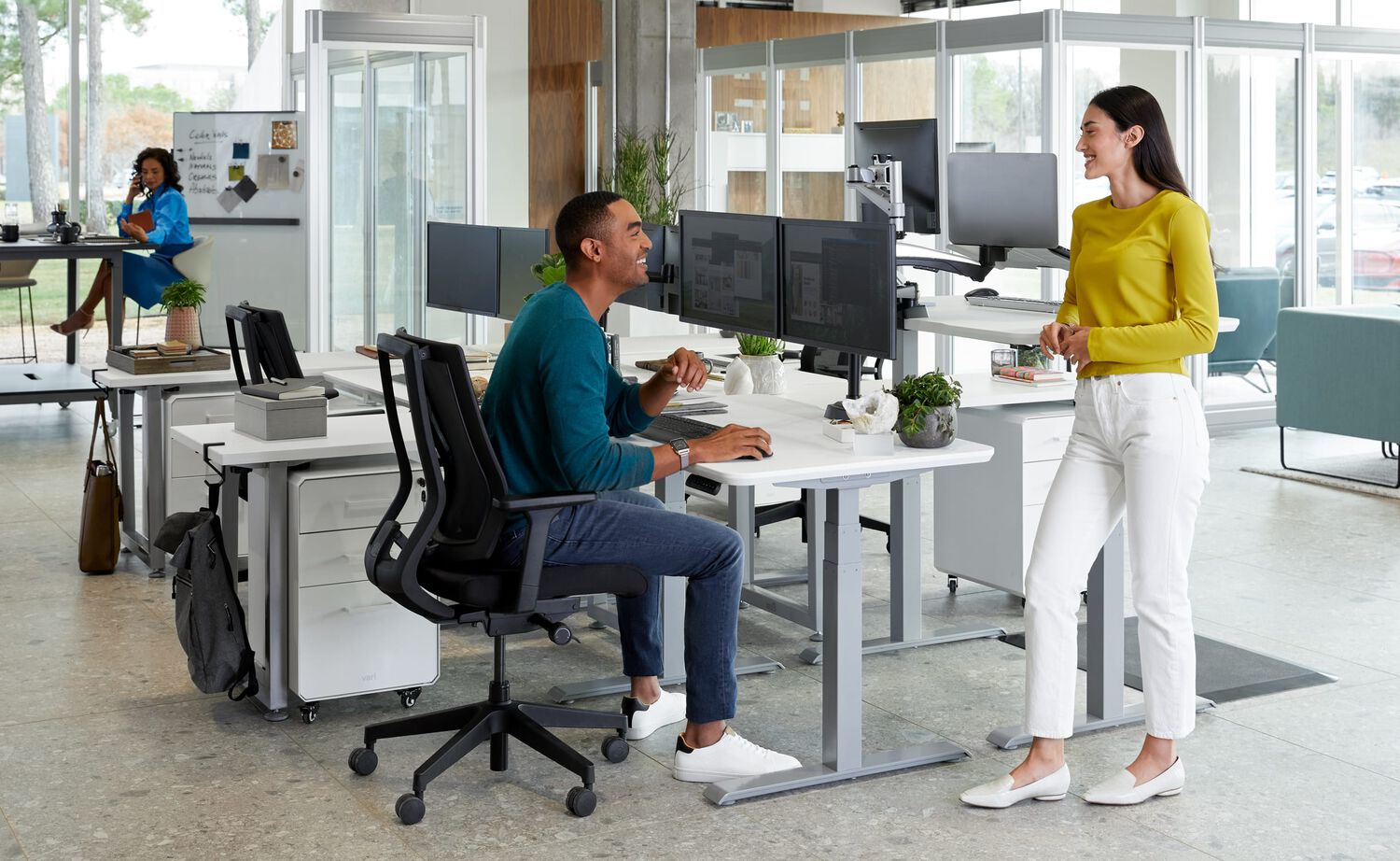 vari office furniture being used by a team in a commercial office workplace