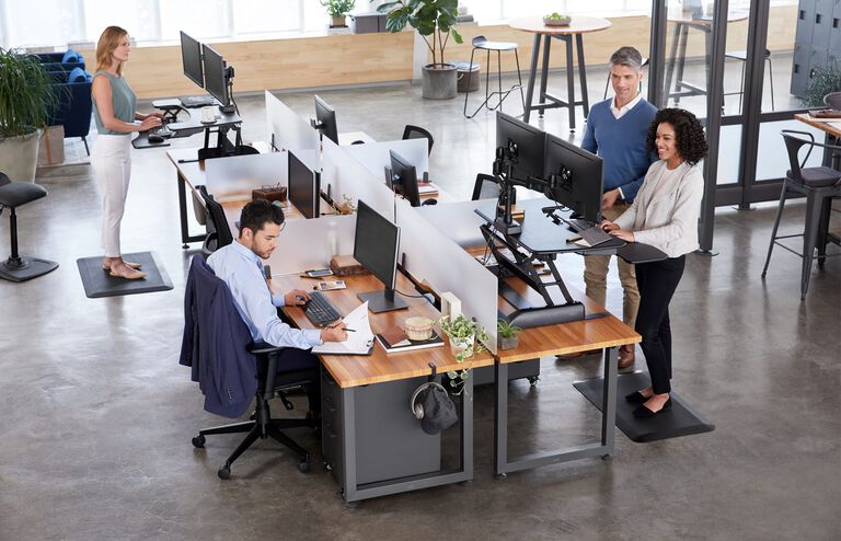 Privacy panels used to create distinct personal space while keeping the open office open.