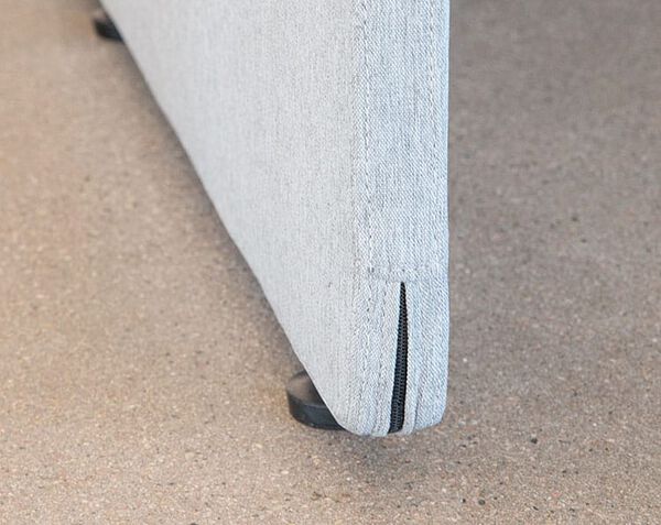 close up view of the bottom corner of a quickflex cube and the leveling foot at the bottom