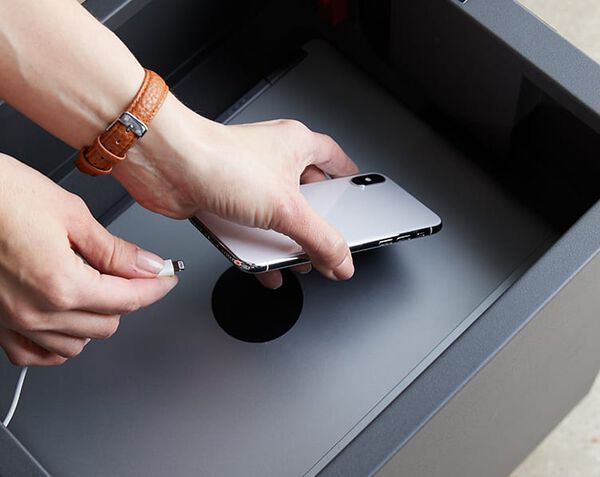 Indivial charging cell phone in Vari locker seat