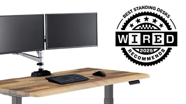 electric standing desk with a blue layover withe the wired logo saying best standing desks twenty twenty five recommends