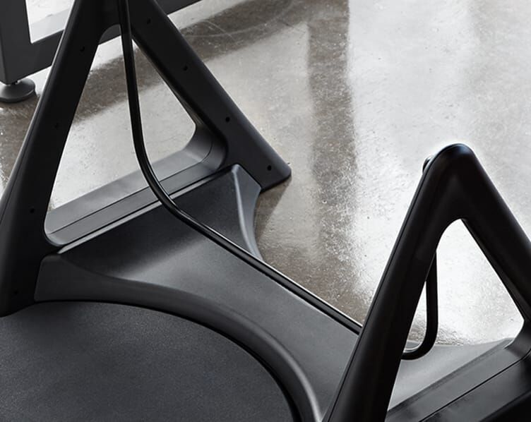 close up view of the rocker bar on the activemat rocker in an office setting