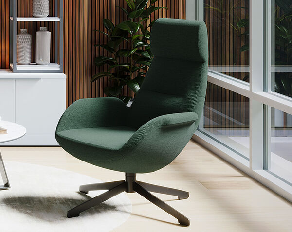 Lounge Chair next to a side table in office setting