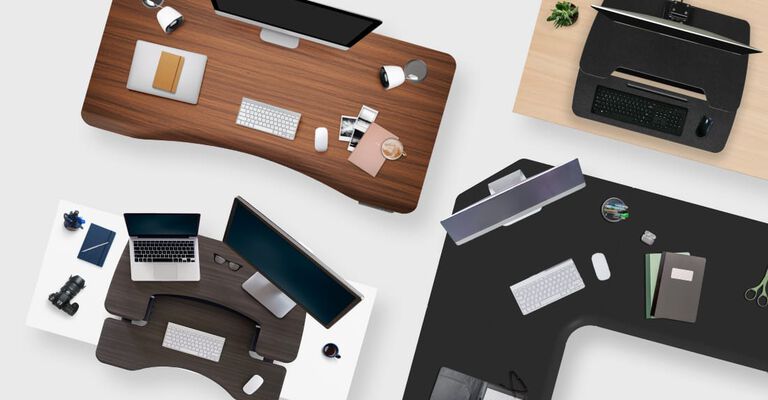 Side views of variety of standing desk solutions